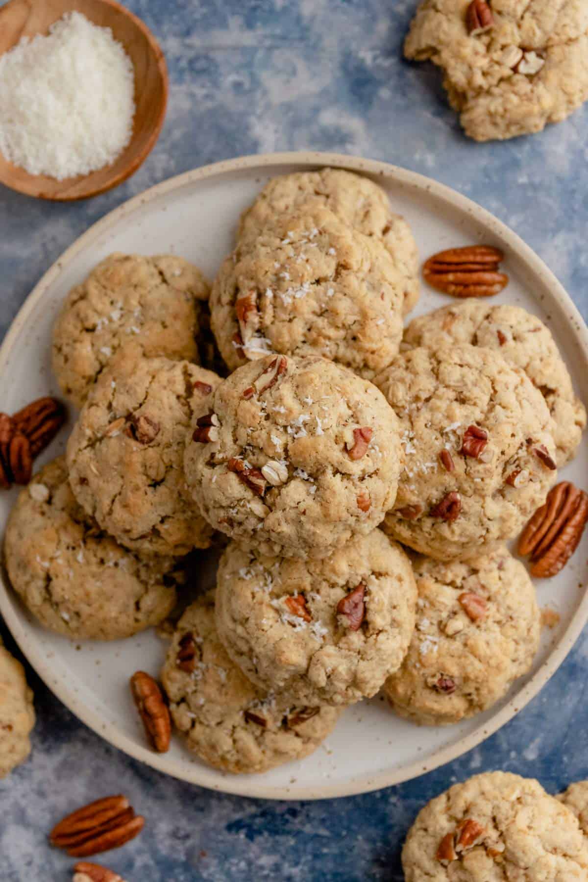 a stack of coconut oatmeal pecan cookies