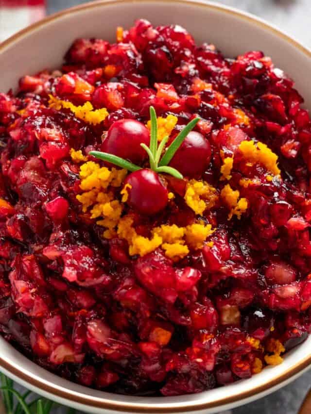 orange cranberry walnut relish in a bowl.