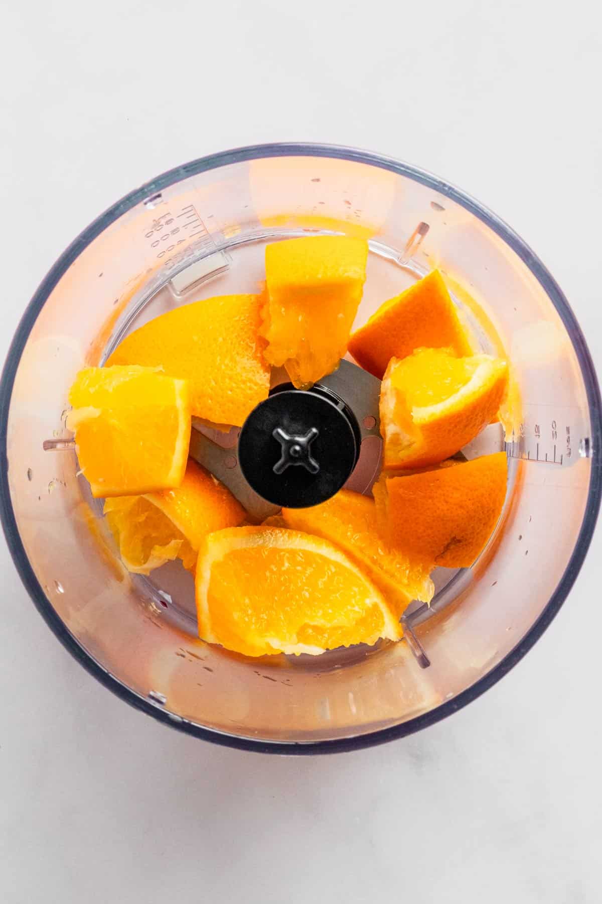oranges in food processor.