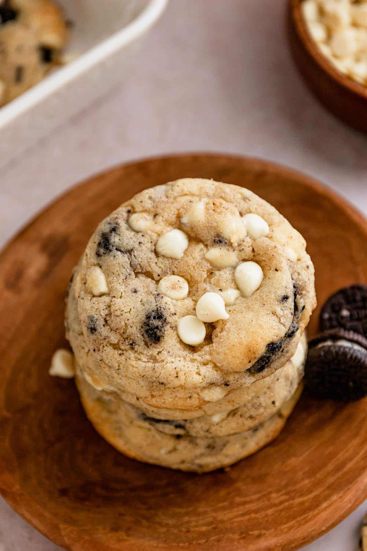 a stack of oreo cream cheese cookies with white chocolate chips