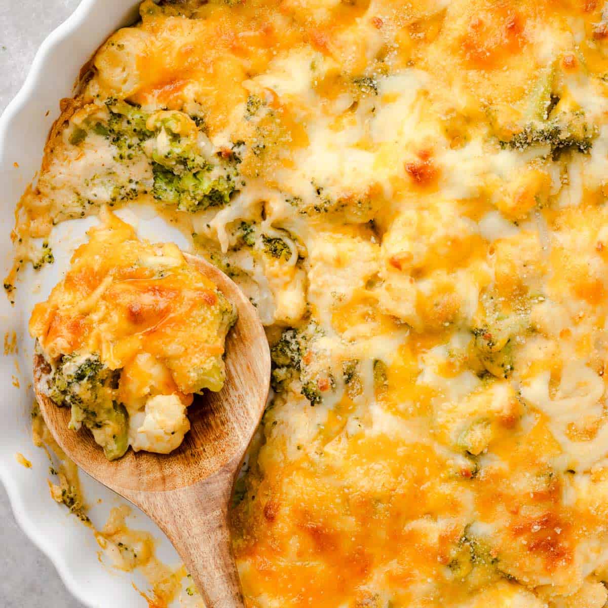 Broccoli cauliflower casserole with melted cheese layer.