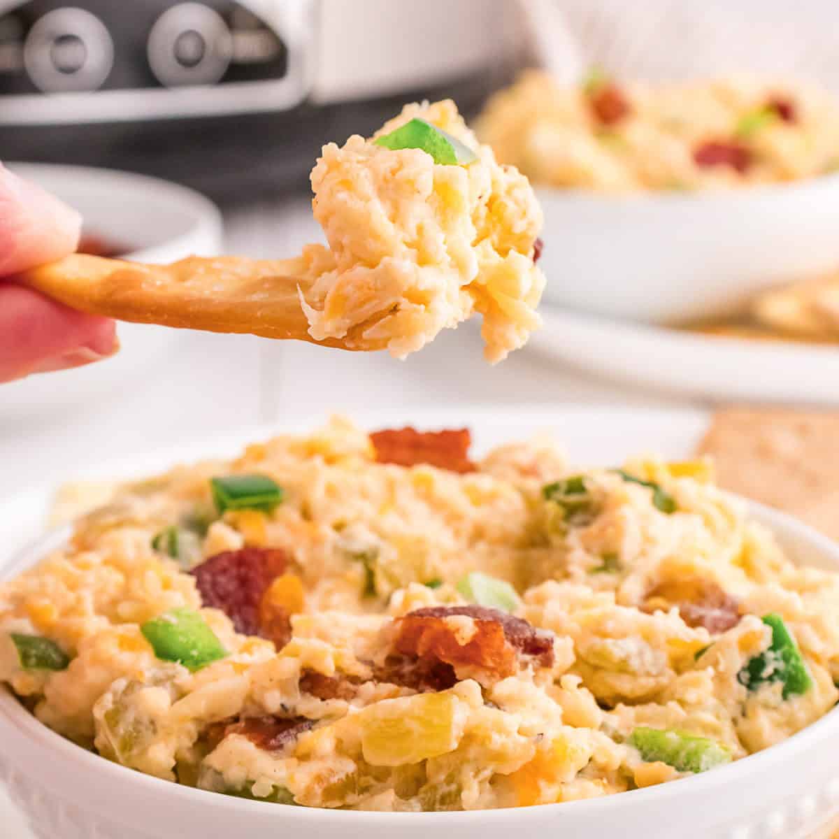 jalapeno popper dip served with crackers.