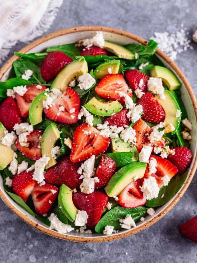 Spinach Strawberry Salad With Feta in a bowl