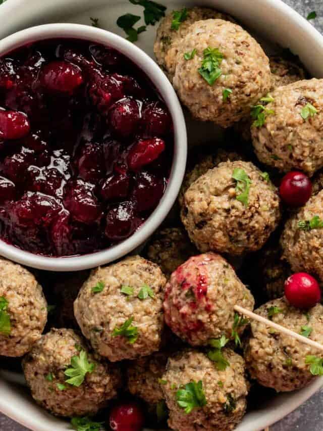 turkey stuffing meatballs served with cranberry sauce.