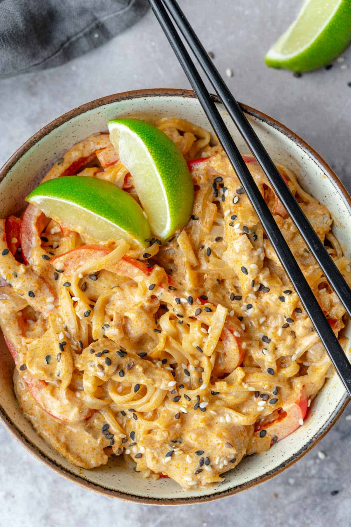 These Thai Red Curry Chicken Noodles are the perfect easy dinner recipe that will be ready in 15 minutes! This bowl of noodles is huge on flavor and is packed with bites of tender chicken, coconut milk, rice noodles, spices, and lime juice. Comforting, filling, and gluten free!