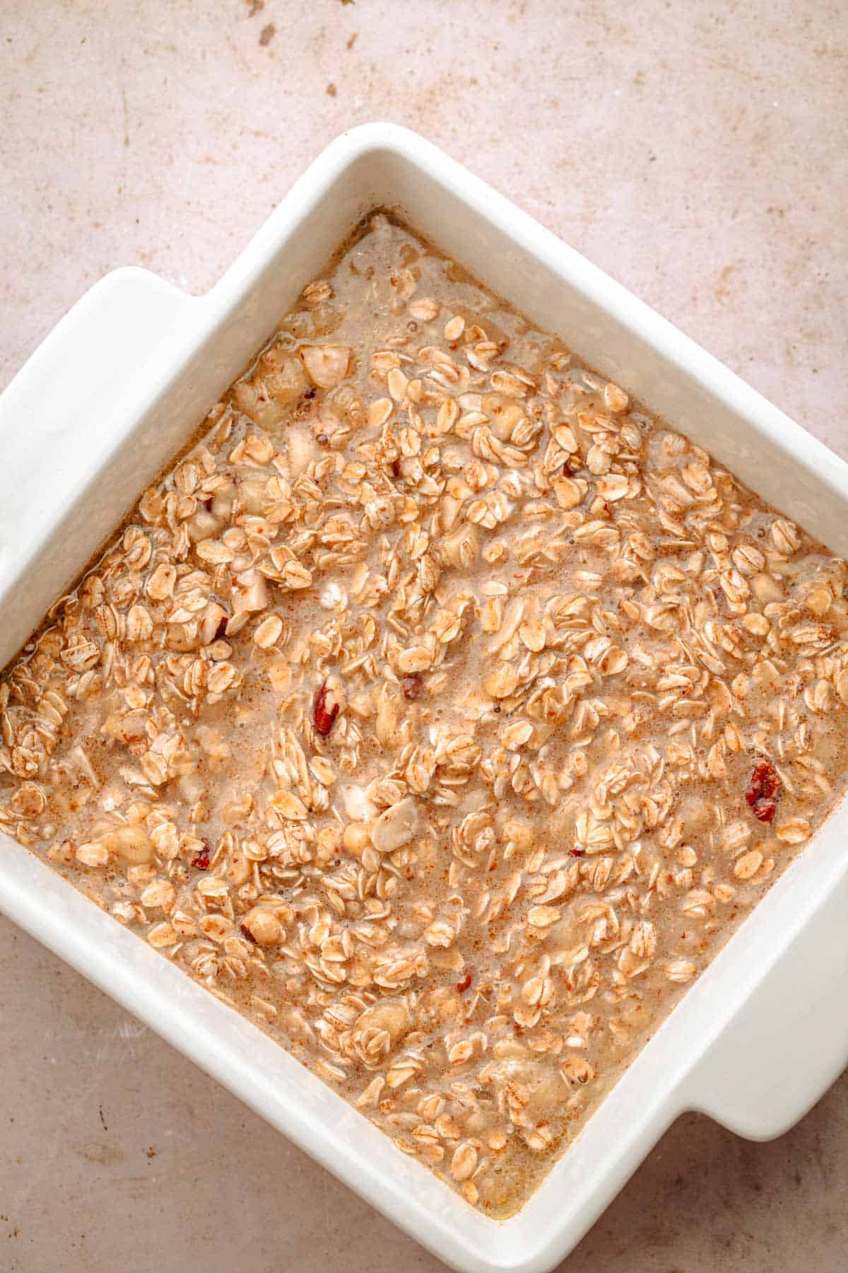 Dry ingredients mixed in a bowl for baked oatmeal.
