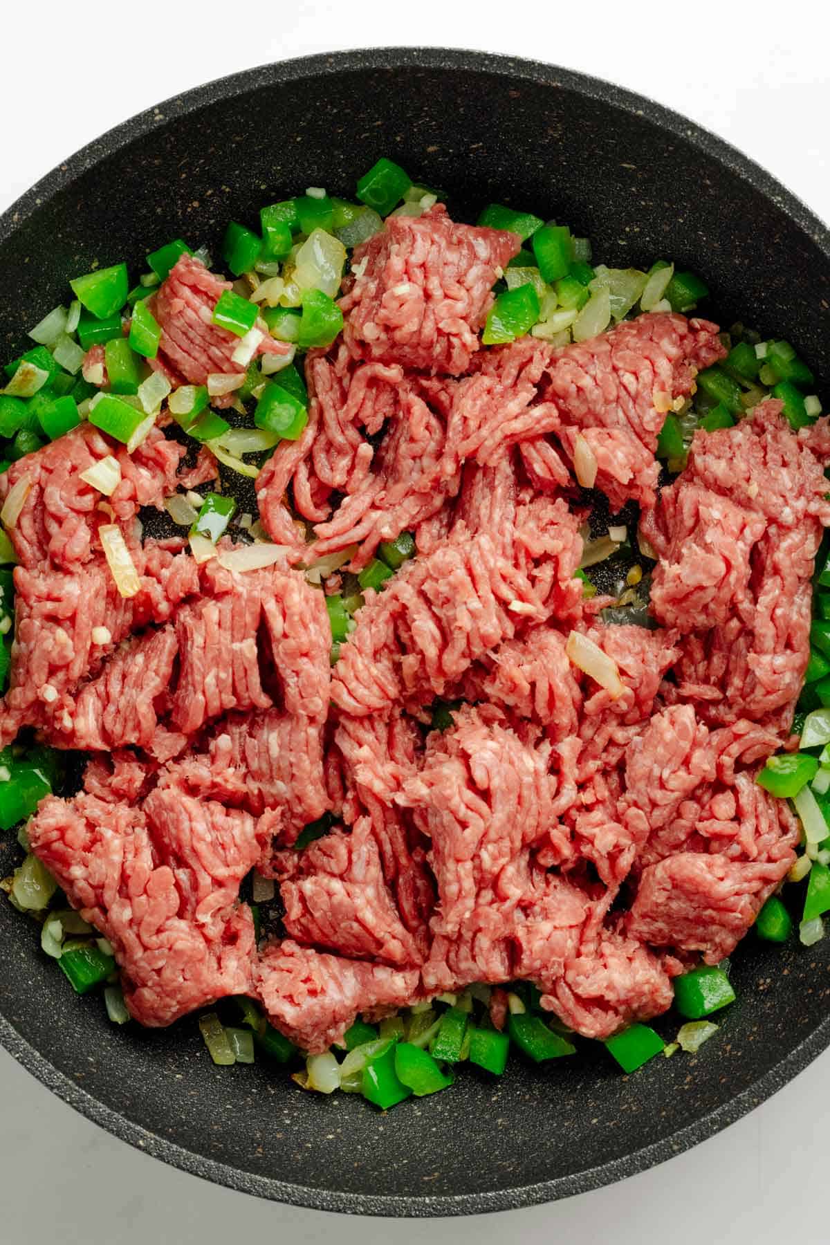 Ground beef in skillet.