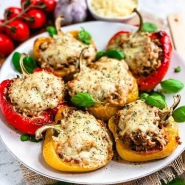 These stuffed bell peppers are easy to make, quick and filling. This recipe has the best of simple ingredients – fresh bell peppers, ground beef, onions, tomatoes, cheese and the right seasonings that come together in a beautiful tasty meal.