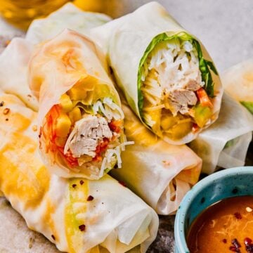 Finished chicken spring rolls ready to serve.