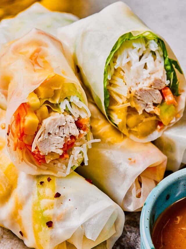 Finished chicken spring rolls ready to serve.