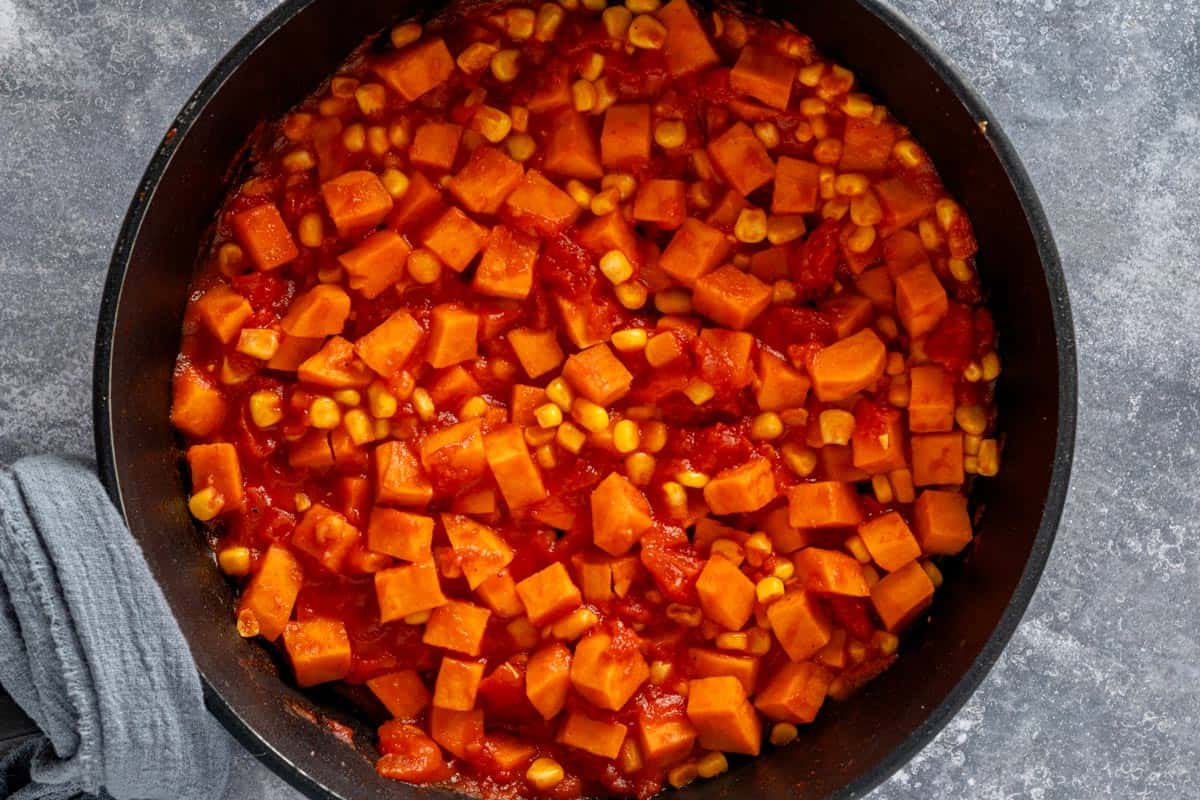 sweet potatoes simmering in skillet.