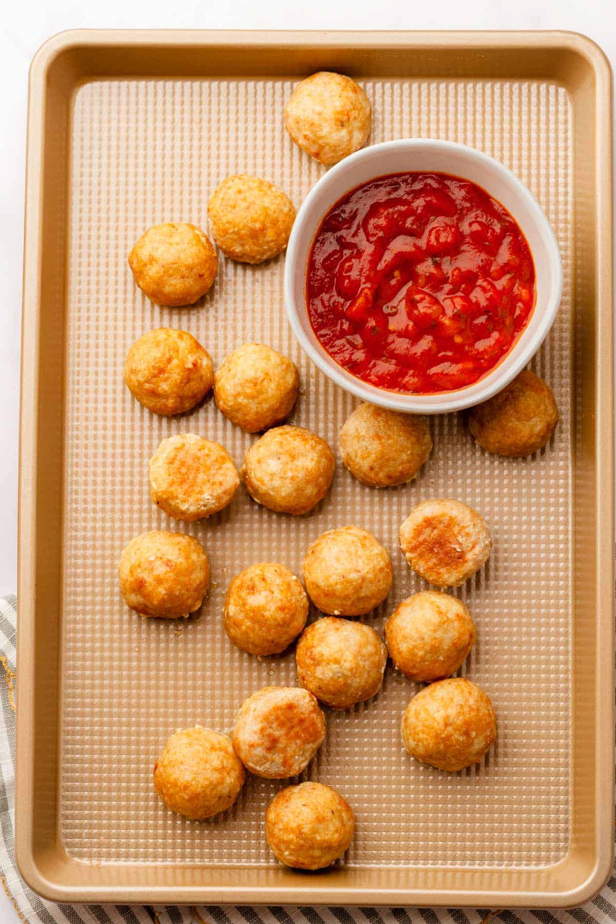 Golden brown healthy chicken meatballs.