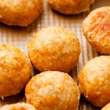 Golden brown ground chicken meatballs.