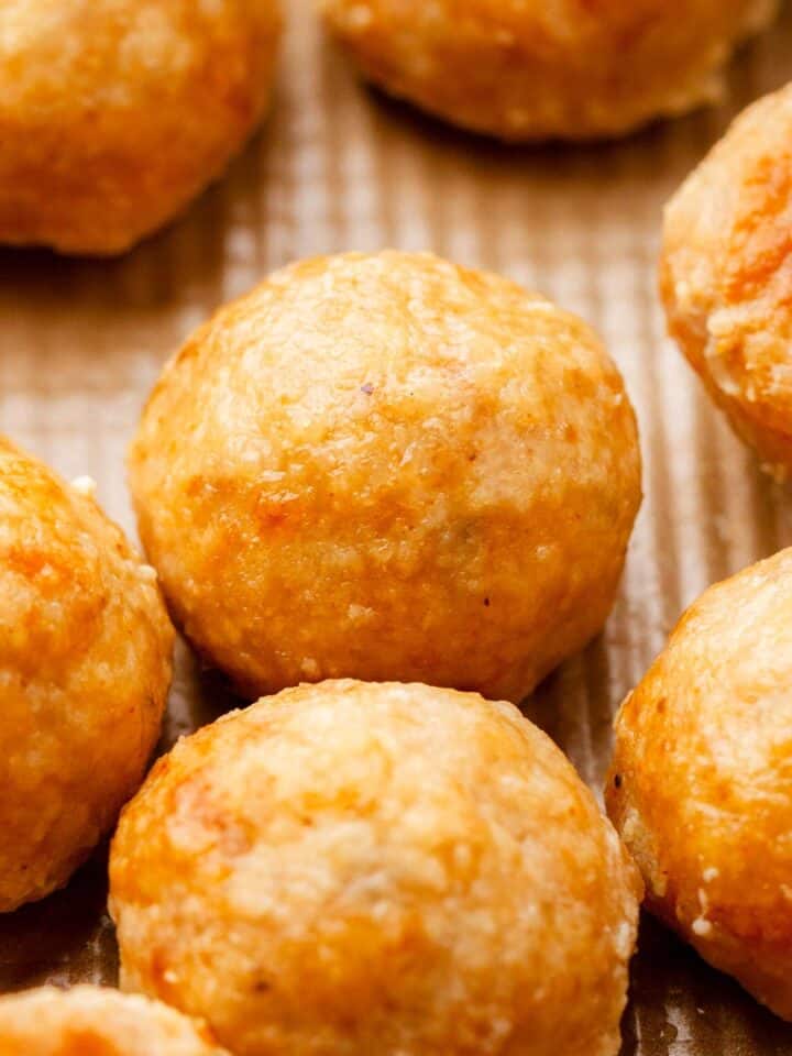 Golden brown ground chicken meatballs.