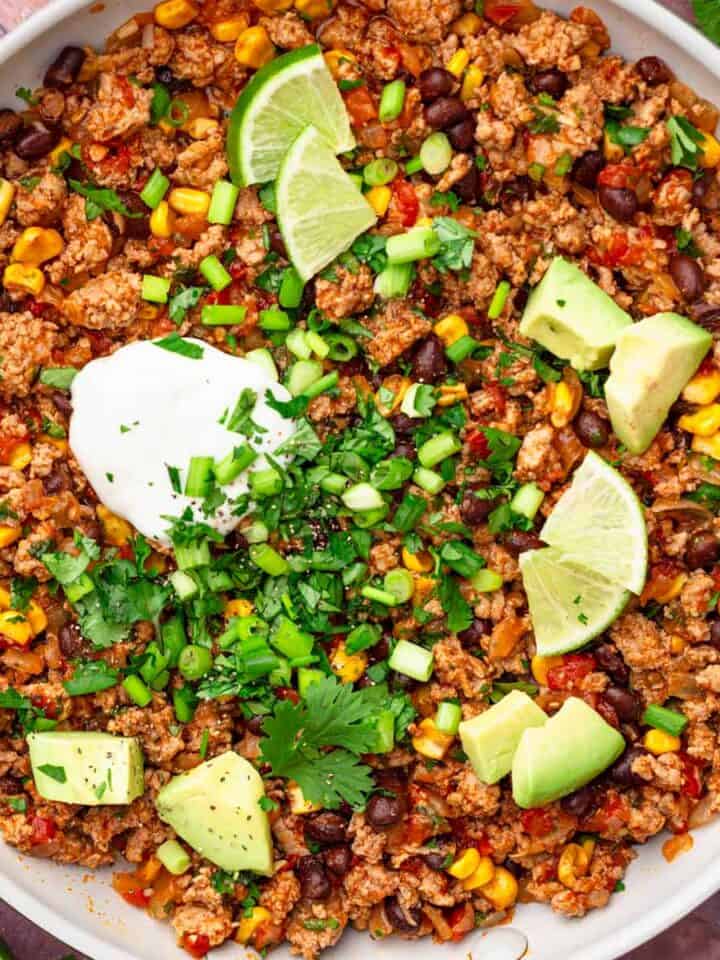 Easy ground turkey skillet with beans and avocado.