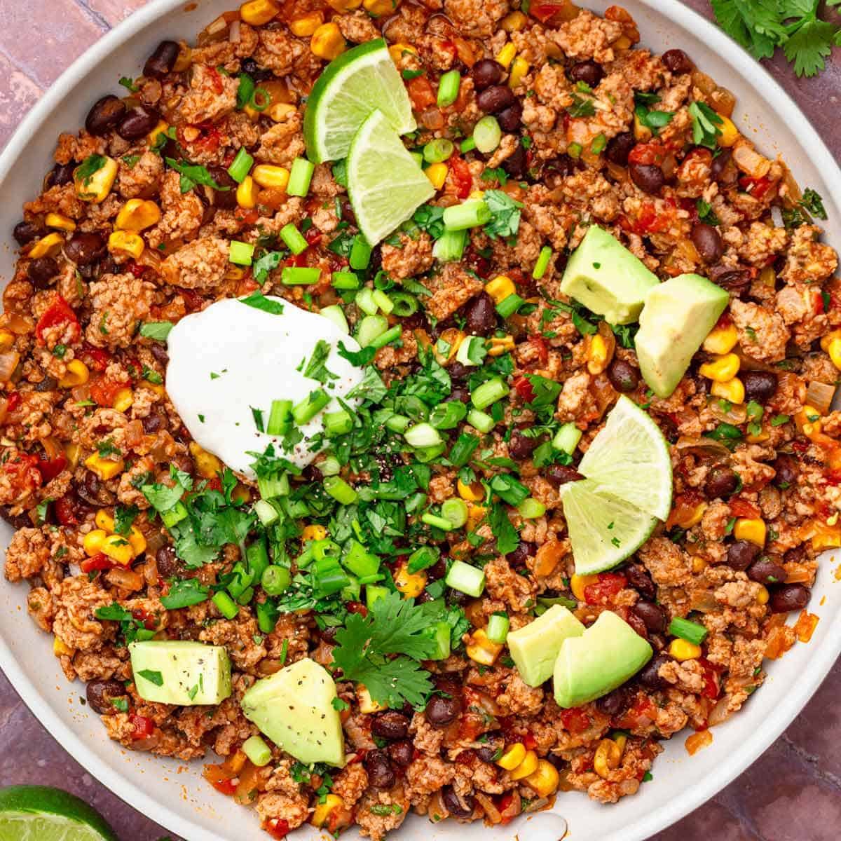 Easy ground turkey skillet with beans and avocado.