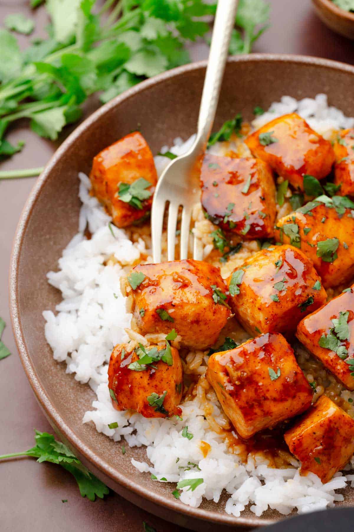 hot honey salmon bites with rice bowls.