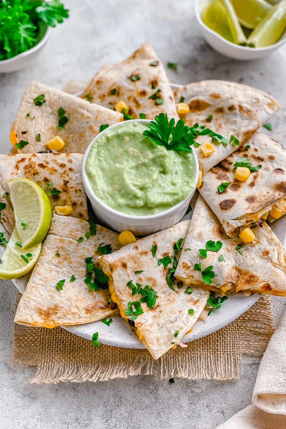 These Mexican Quesadillas are loaded with black beans, sweet corn, and two kinds of gooey melted cheese. Soft tortillas are then lightly toasted on a skillet until crisp. You’ll love this recipe as they make a great hearty lunch or easy dinner in just under 30 minutes.
