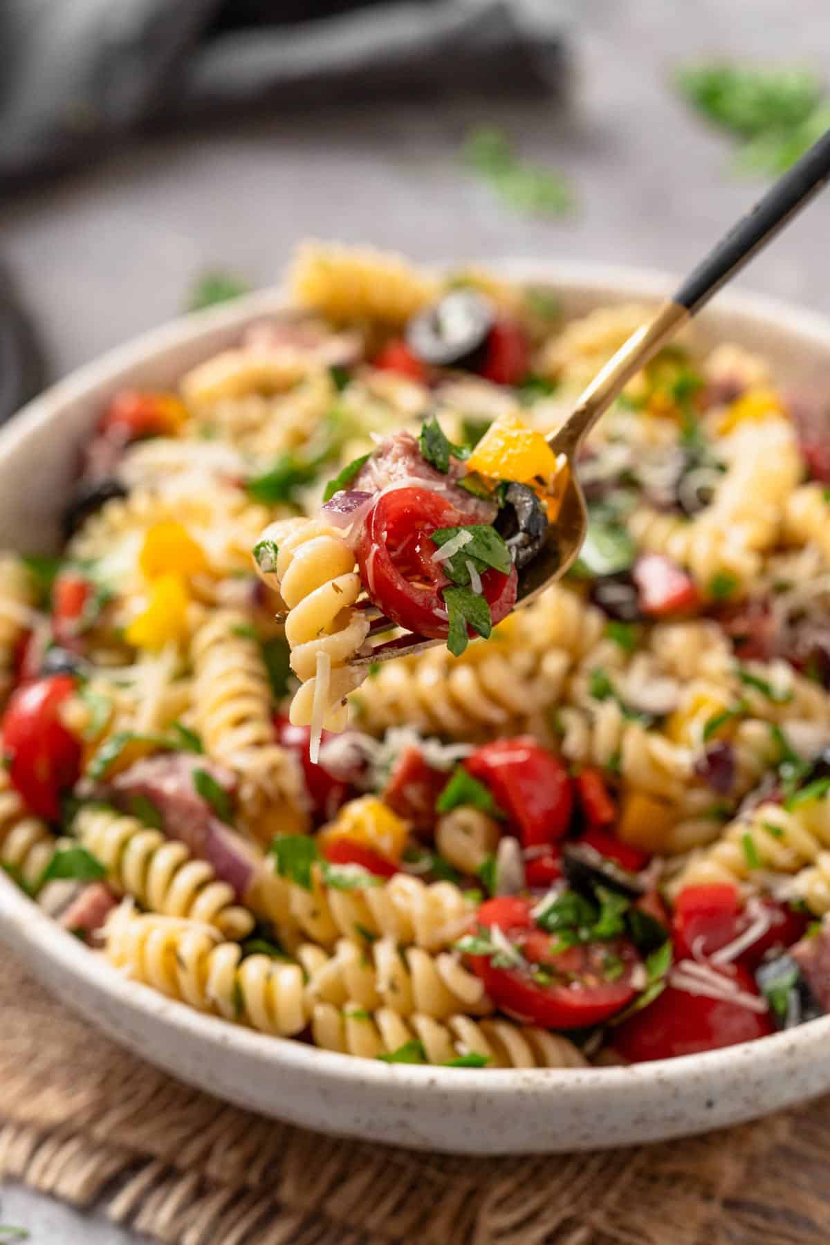 Cold Pasta Salad With Smoked Sausage-The Yummy BowlA simple and savory cold pasta salad made with smoked sausage (or salami), veggies, gluten free pasta and Oregano Mustard Vinaigrette salad dressing. Can be served hot or cold to fit any season! #pastasalad #italianpastasalad #easypastasalad #pastasaladdressing