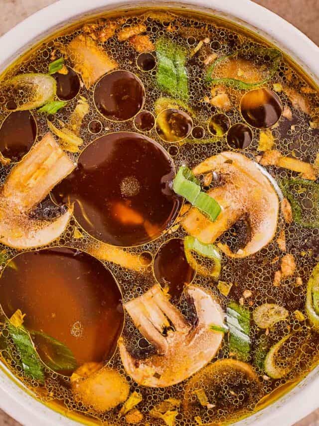 Easy Japanese clear soup made with mushrooms, carrots, green onions, garlic, and sesame oil.