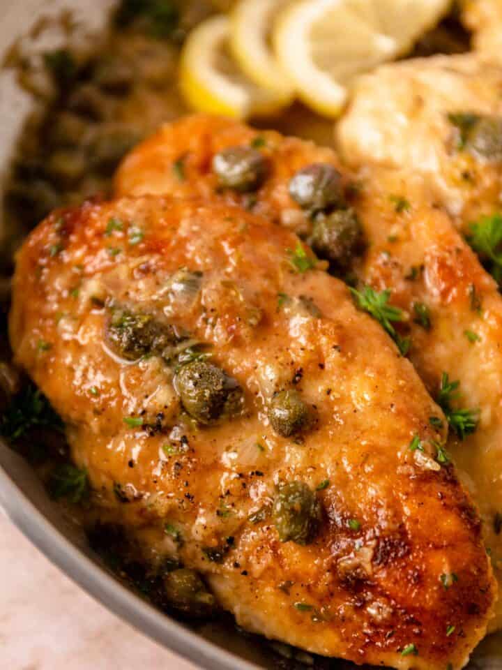 lemon caper chicken piccata in a skillet