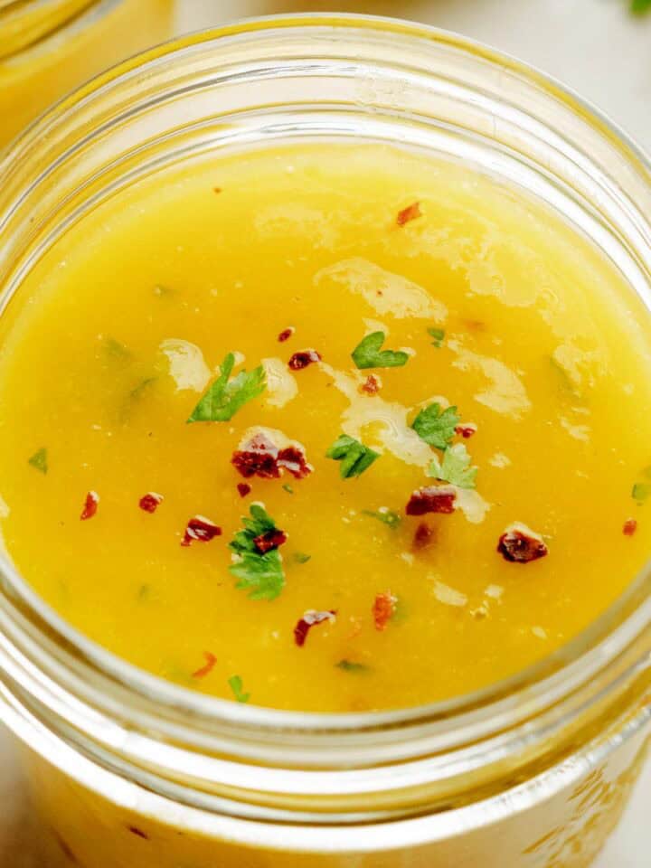 Mango salad dressing in a jar.