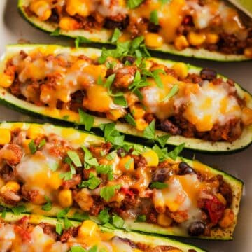 taco zucchini boats stuffed with ground beef and cheese.