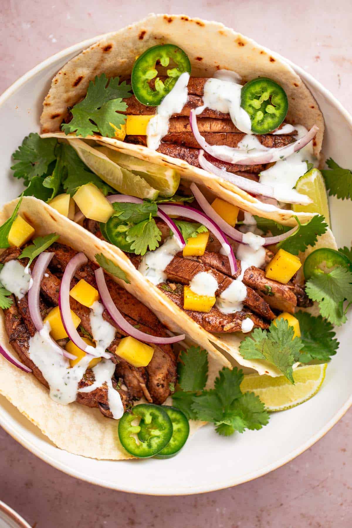 Mushroom tacos with mango and herb sauce.