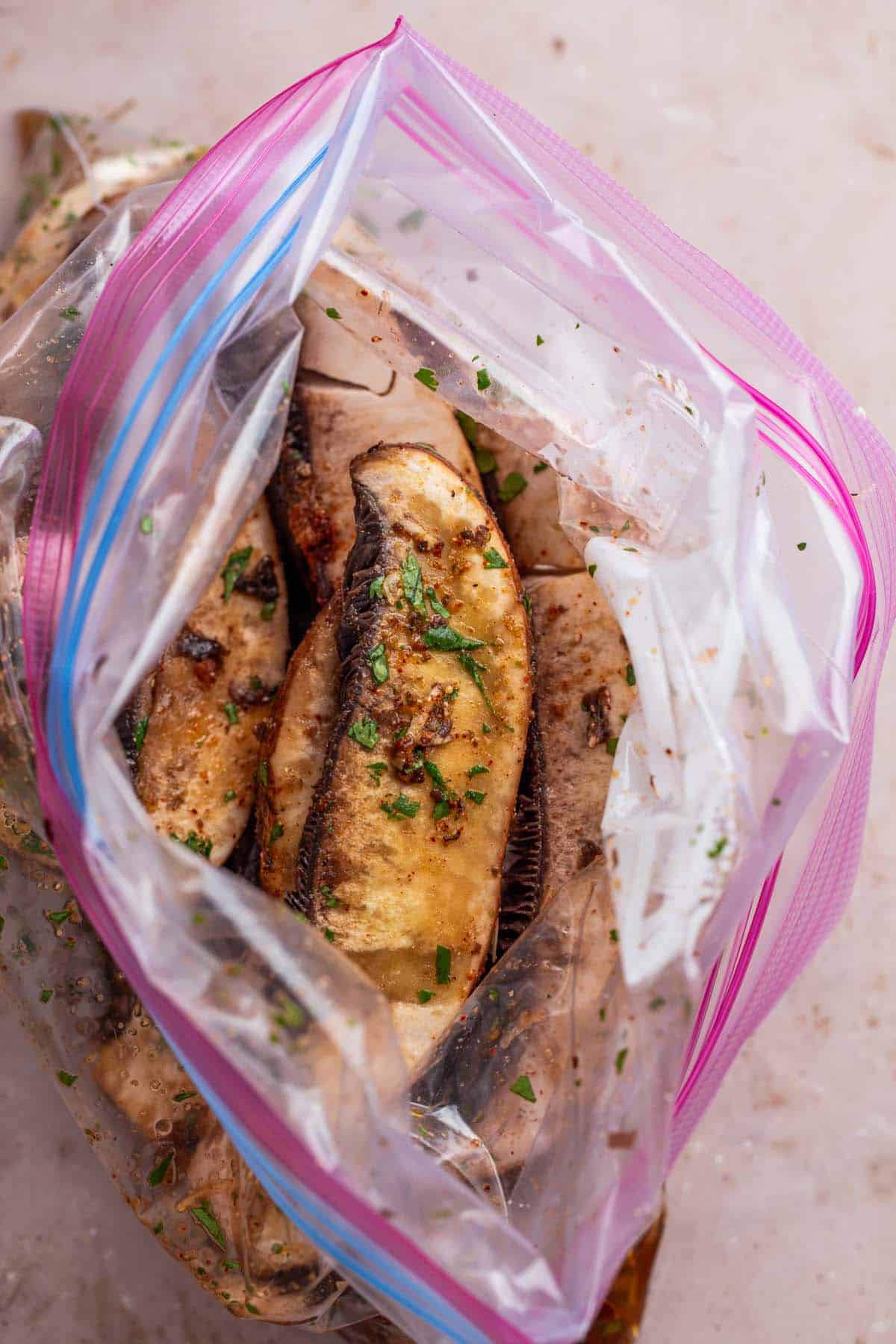 Mushrooms marinating in a ziplock bag.
