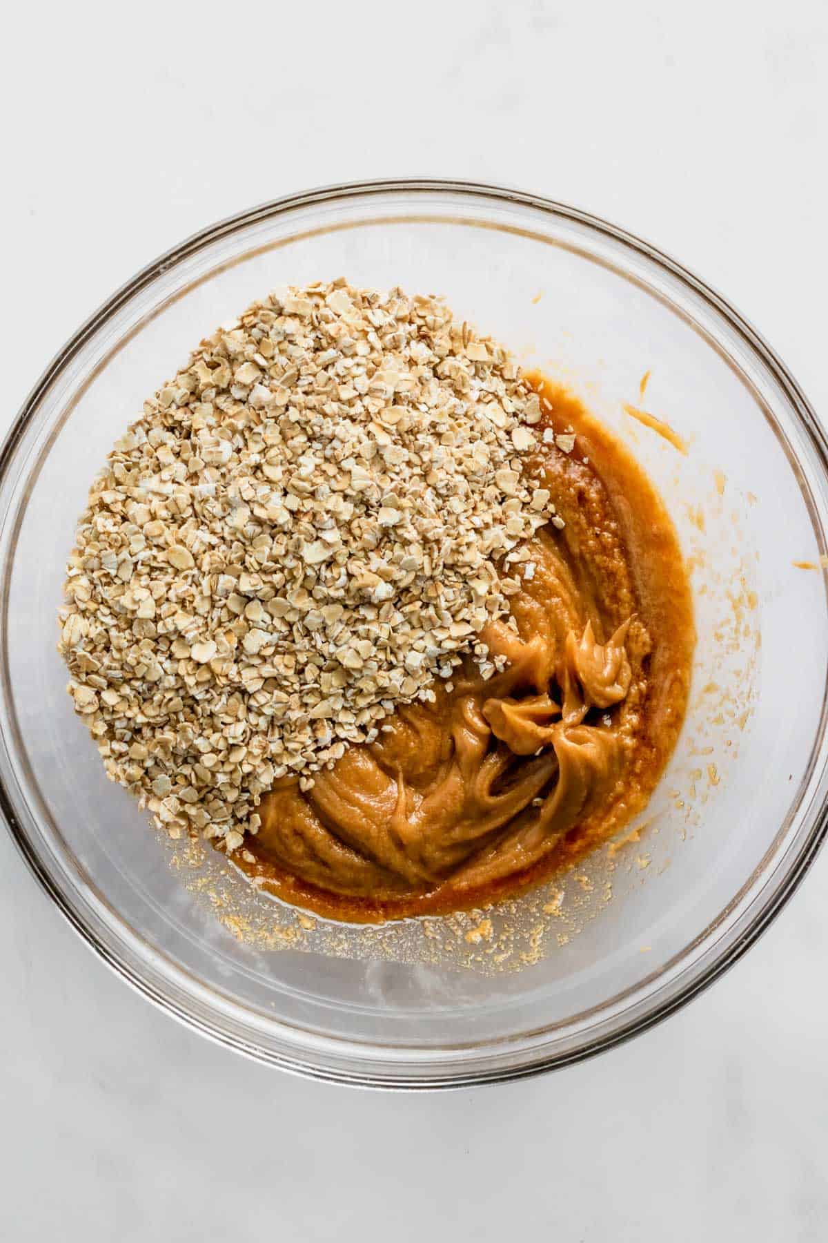 oats and peanut butter mixed together in a bowl