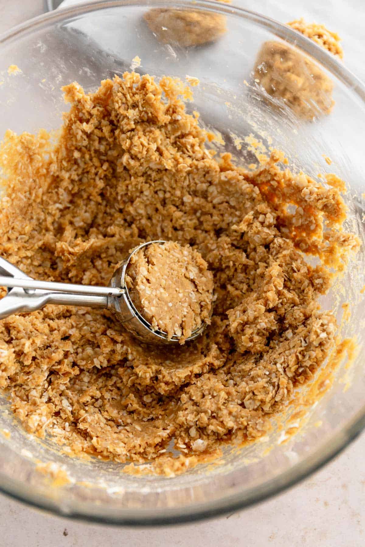 oats peanut butter and maple syrup mixed together in a bowl