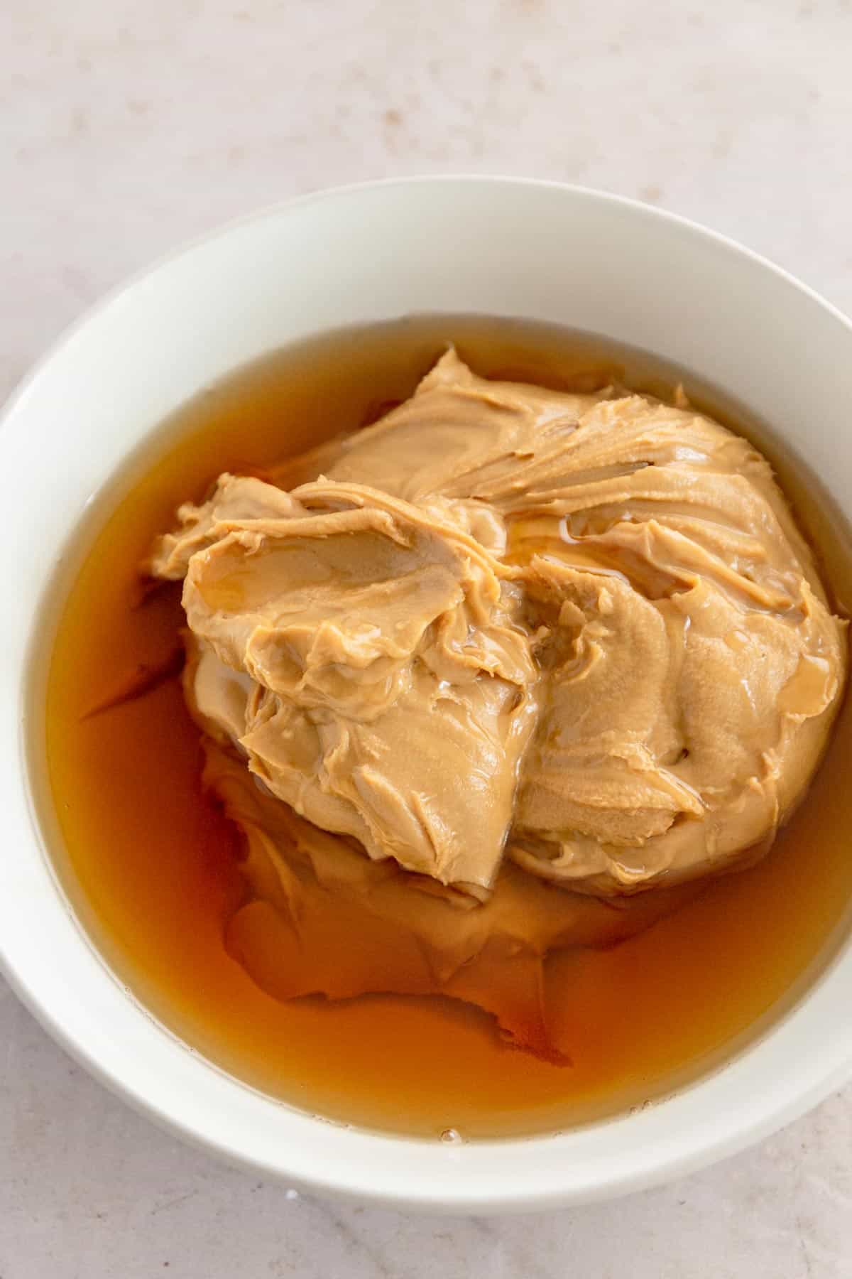peanut butter and maple syrup mixed in a bowl