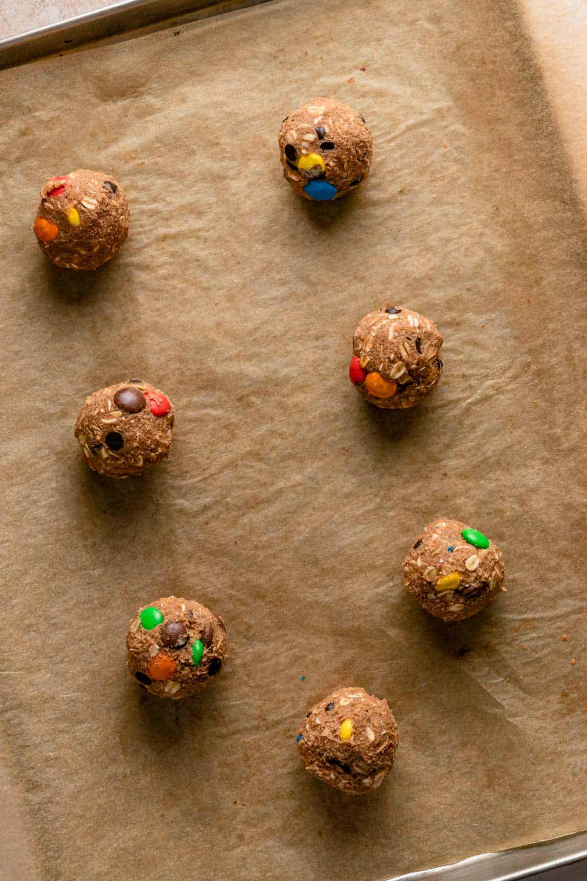 oatmeal nutella monster cookie dough balls on baking sheet