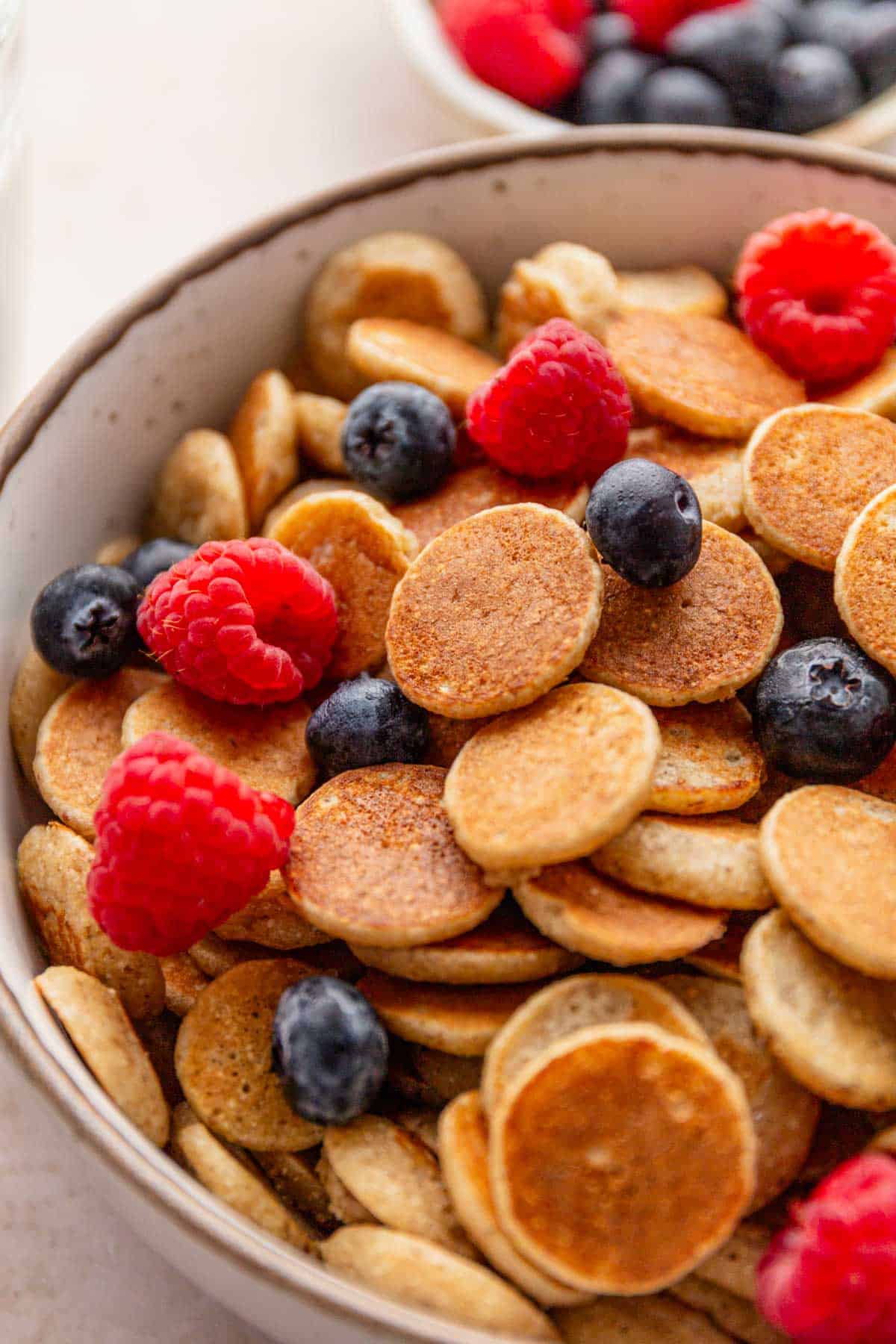mini pancakes with berries.