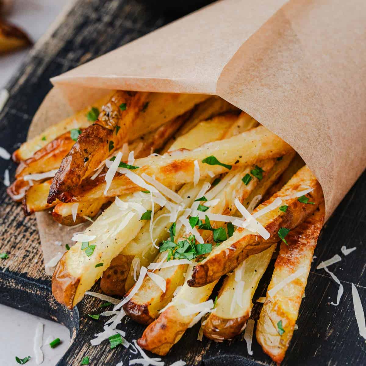 This recipe for Homemade Parmesan Truffle Fries is so good, no frying, easy and quick! Paired with delicious sweet paprika dipping sauce makes it a beautiful lazy evening dinner meal. The Yummy Bowl