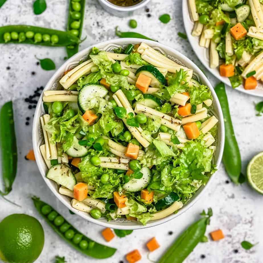 This Pasta Salad Recipe With Cheddar Cheese Cubes is easy to make ahead and is loaded with all the yummy things like peas, lettuce, spring onions, cucumber, and my favorite cheddar cheese.