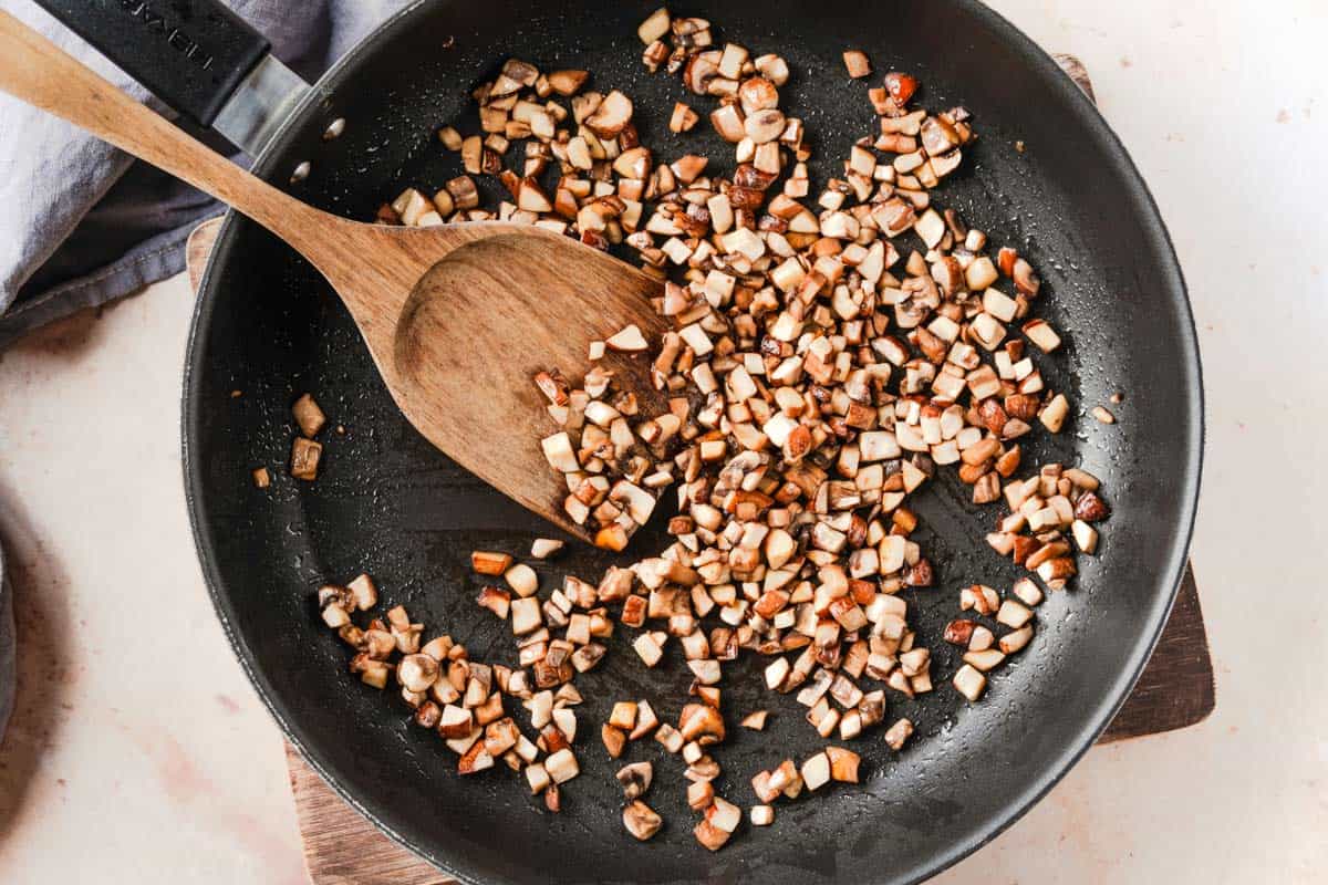 picture of filling for chicken lettuce wraps cooking in a pan