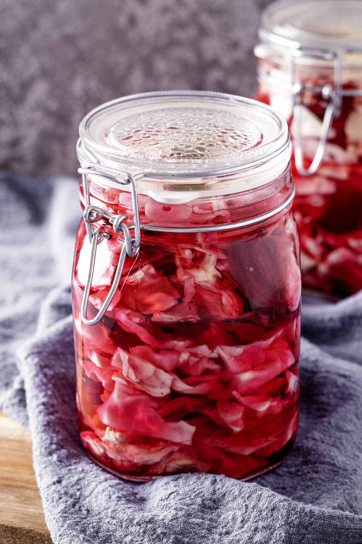 pink crispy pickled cabbage in a jar.