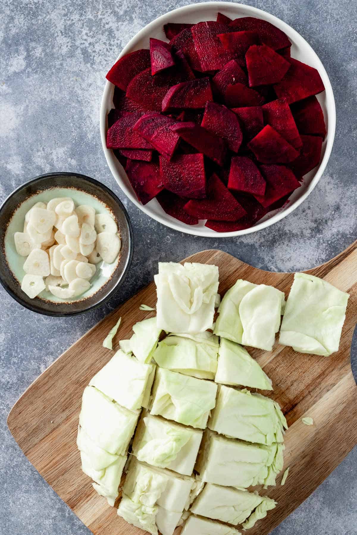 sliced garlic, sliced beets and cabbage.