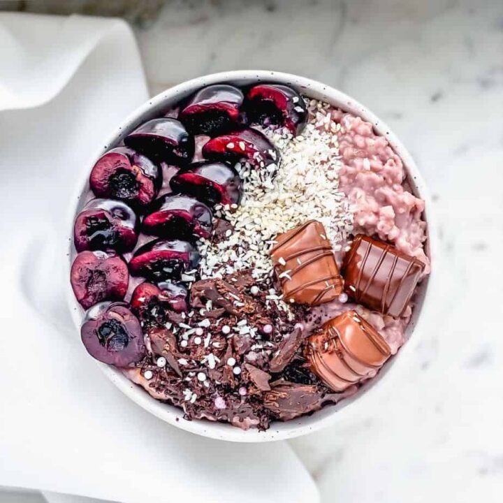 Pink Oatmeal Porridge with Cherries - one of the best flavors of oatmeal I have tried so far. It's delicious, sweet, fulfilling, comforting, and HEALTHY. What else you need your breakfast to be? - The Yummy Bowl