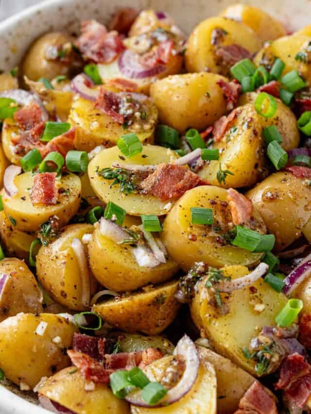 potato salad on a green plate bowl