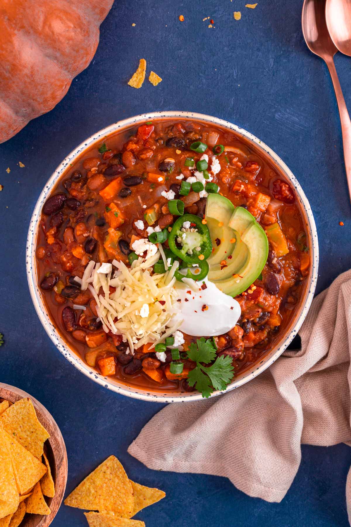 Vegan Pumpkin Chili with sour cream cheese jalapeno toppings