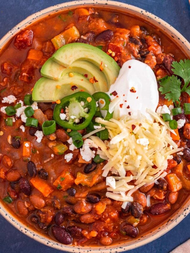 Vegan Pumpkin Chili with sour cream cheese jalapeno toppings