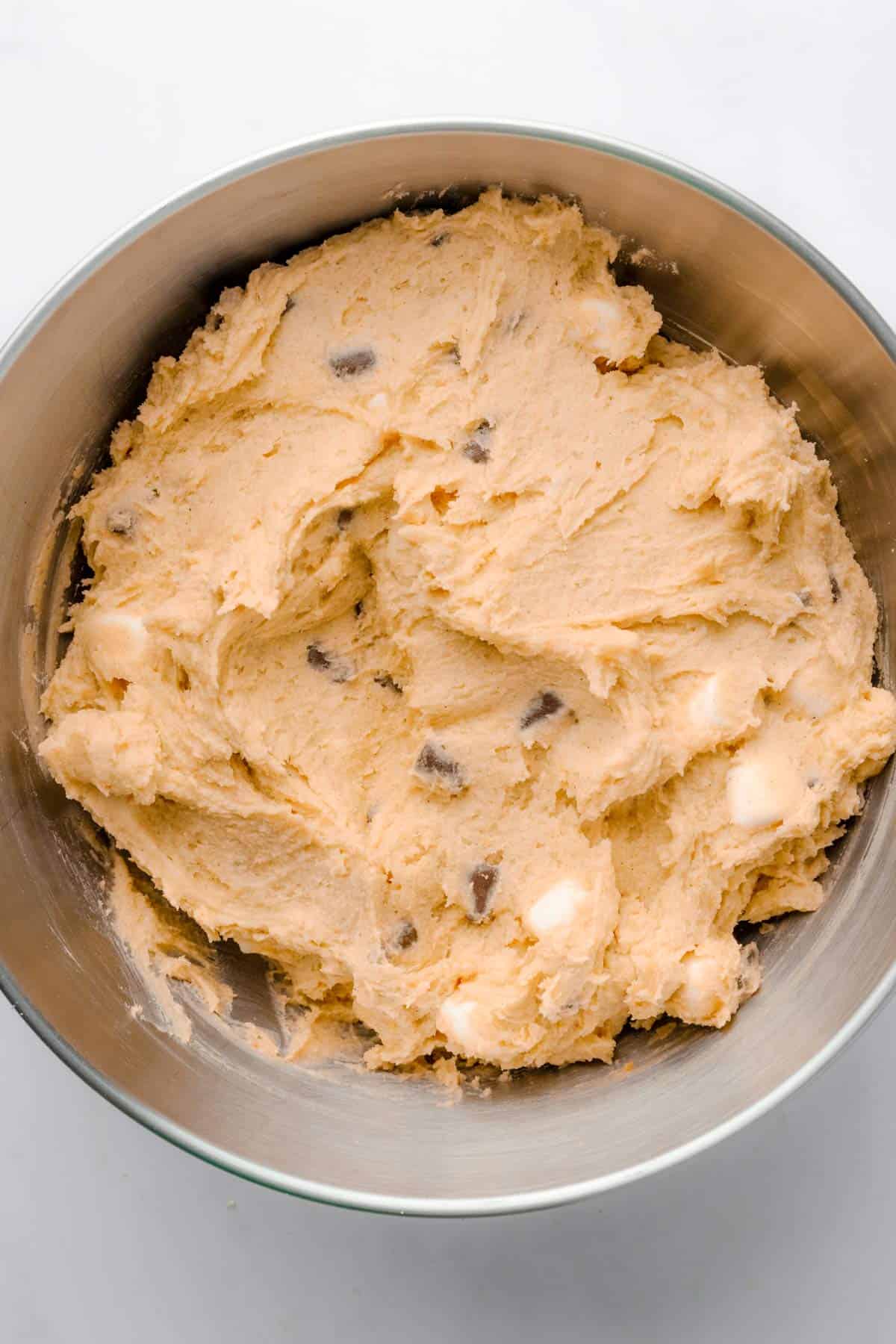 pumpkin cookie batter with chocolate chips and marshmallows.