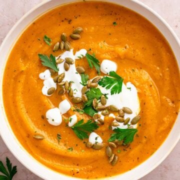 sweet potato pumpkin soup with toppings.