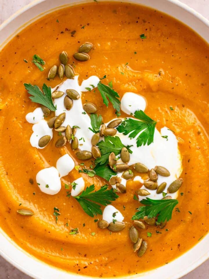 sweet potato pumpkin soup with toppings.
