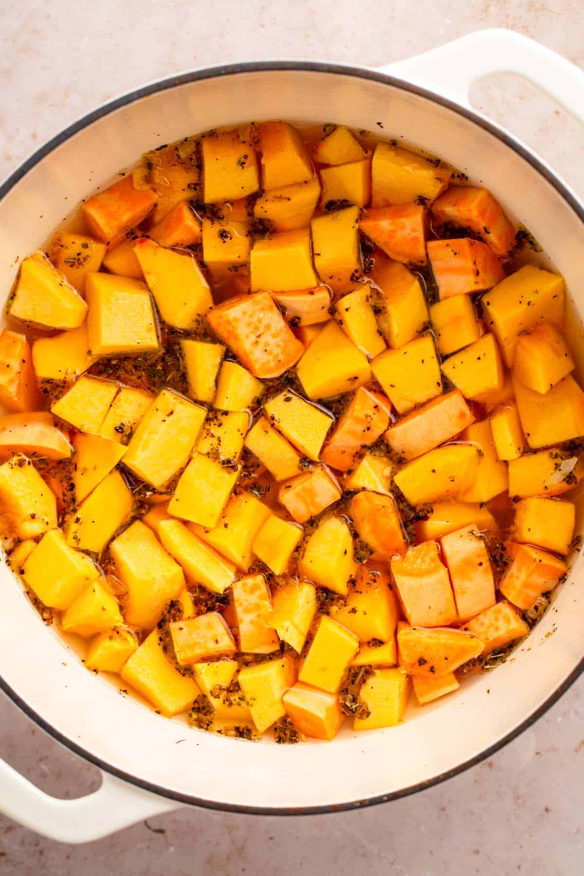sweet potato and pumpkin cubes in a pot.