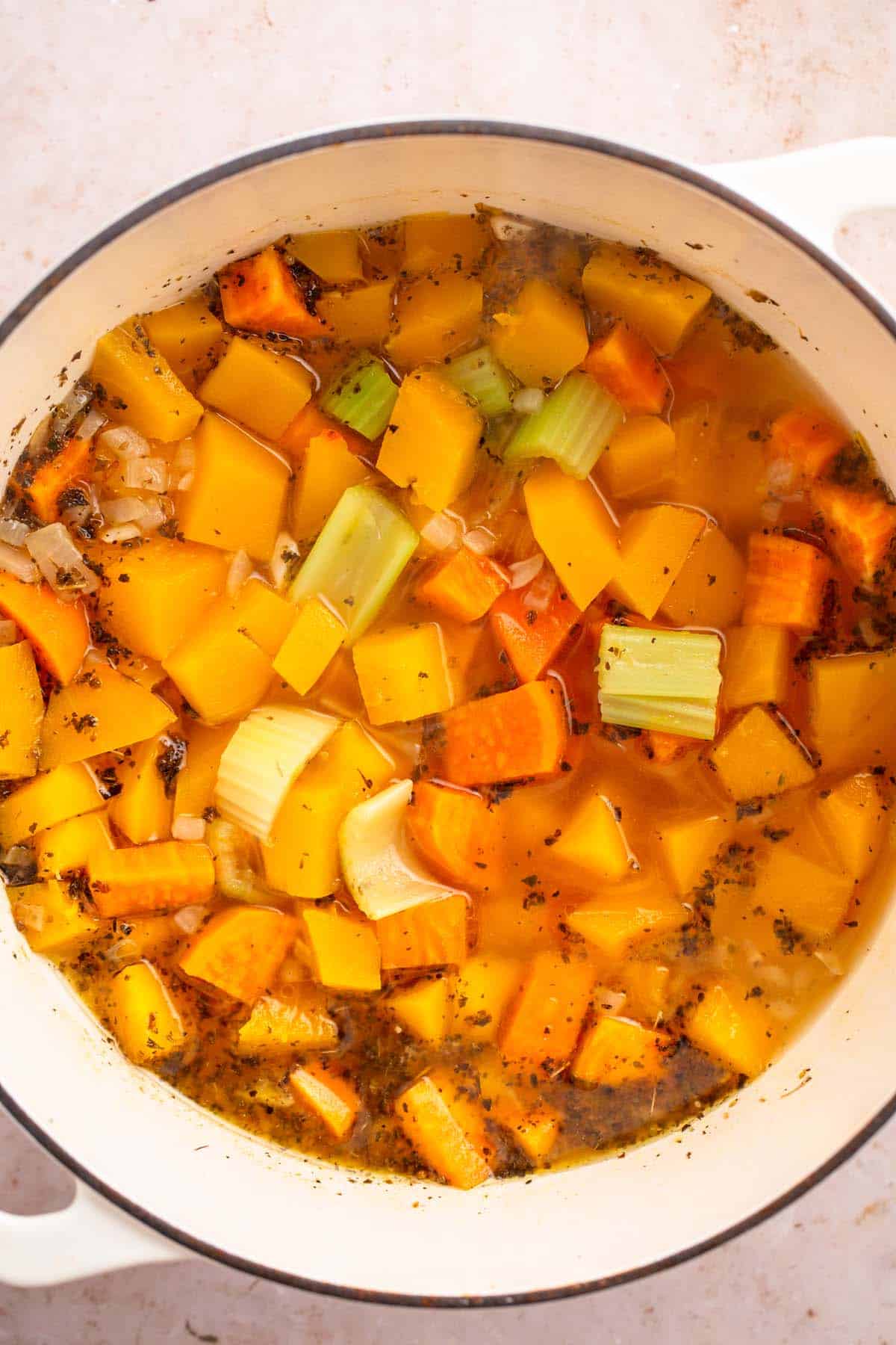sweet potato and pumpkin cubes in a pot.