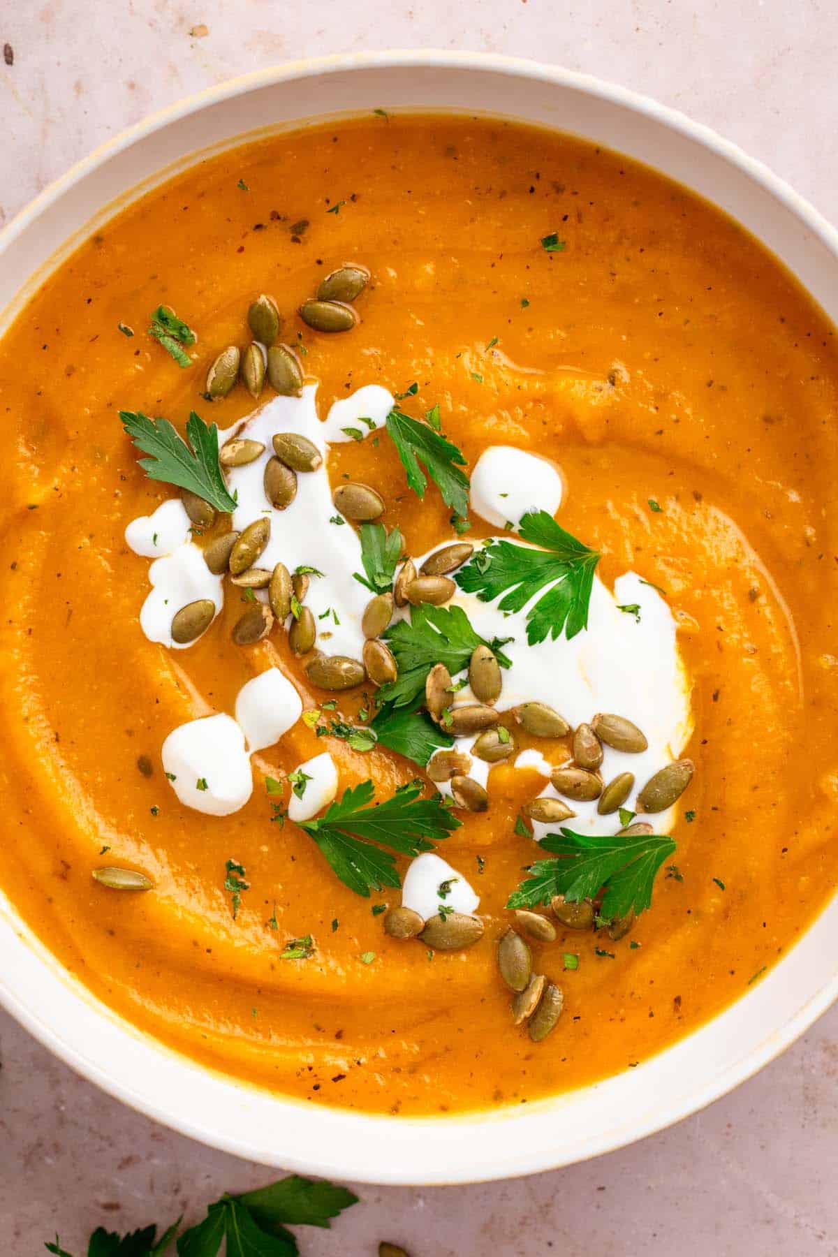 sweet potato pumpkin soup with toppings.