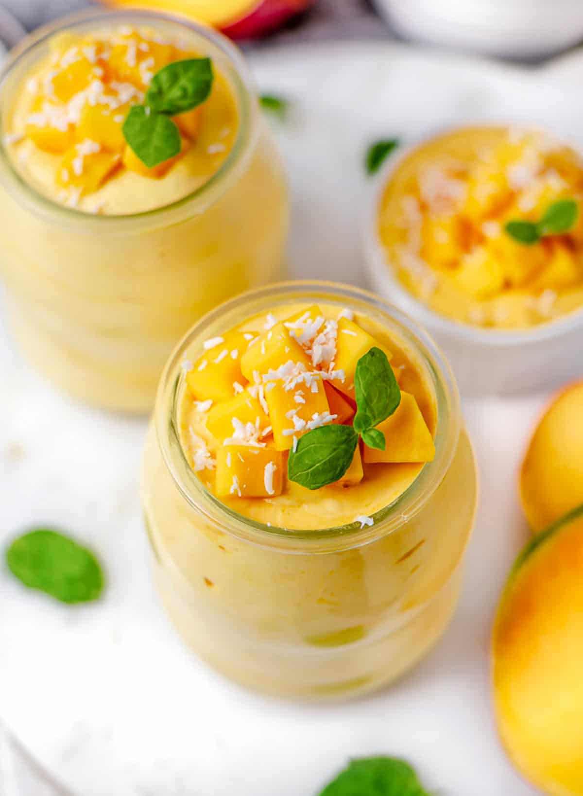bright mango mousse in a glass